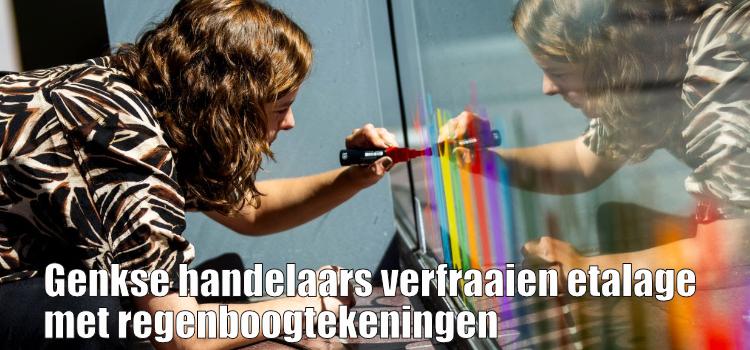 Genkse handelaars verfraaien etalage met regenboogtekeningen